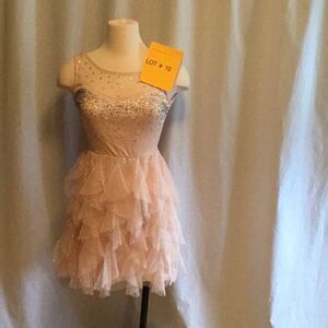 Ladies party dress in 🍑 with 💎 top in size small